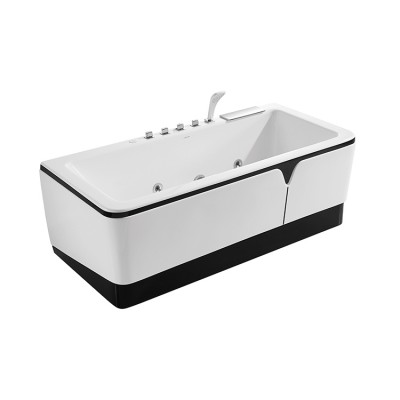 Acrylic soaking freestanding bathtub in bathroom